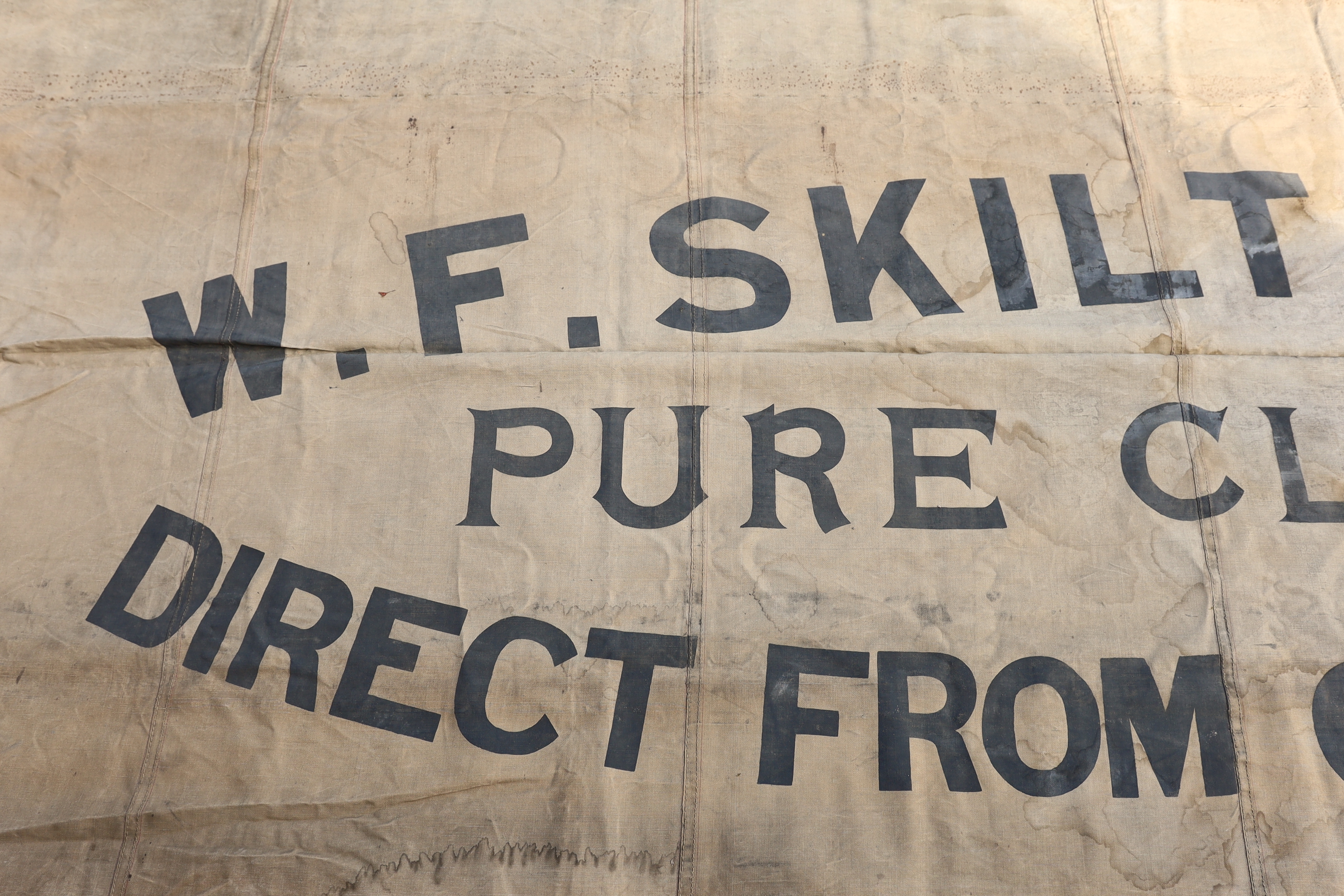 An early 20th Century Skilton Dairy canvas shop sign (van not included!)